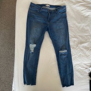 Madewell skinny jeans with distressed knees